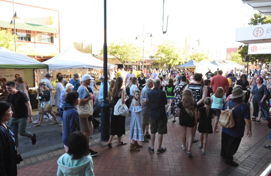 Victoria Street packed with patrons at a previous Taree Night Bazaar. It won't go ahead in 2020 due to the COVID-19 pandemic.