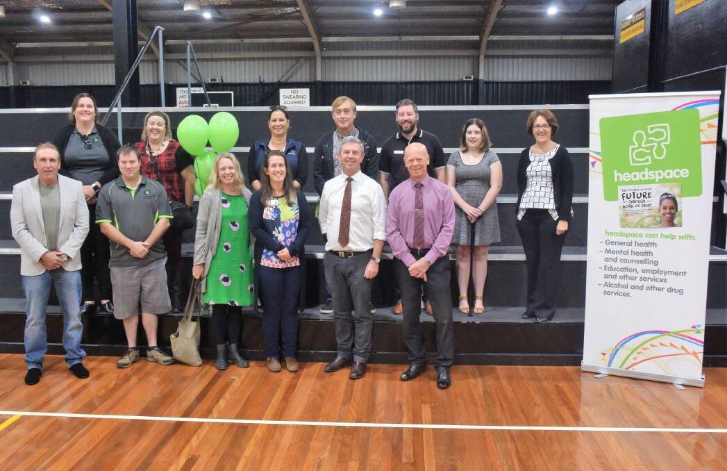 Youth support: The Nationals' Dr David Gillespie and MidCoast Council mayor David West with representatives of Mid North Coast mental health services. Photo: Rob Douglas.