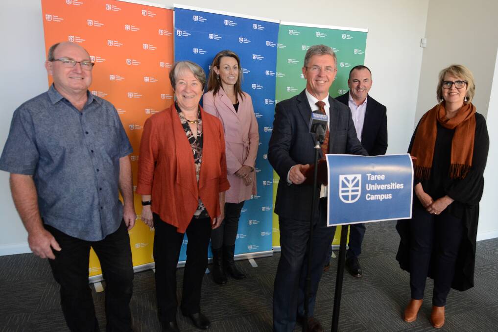 Dream team: Taree Universities Campus board members Graham Brown, Dr Alison McIntosh, Lisa Proctor and Steve Atkins with Member for Lyne Dr David Gillespie and campus chief executive Donna Ballard at the announcement. Photo: Scott Calvin.