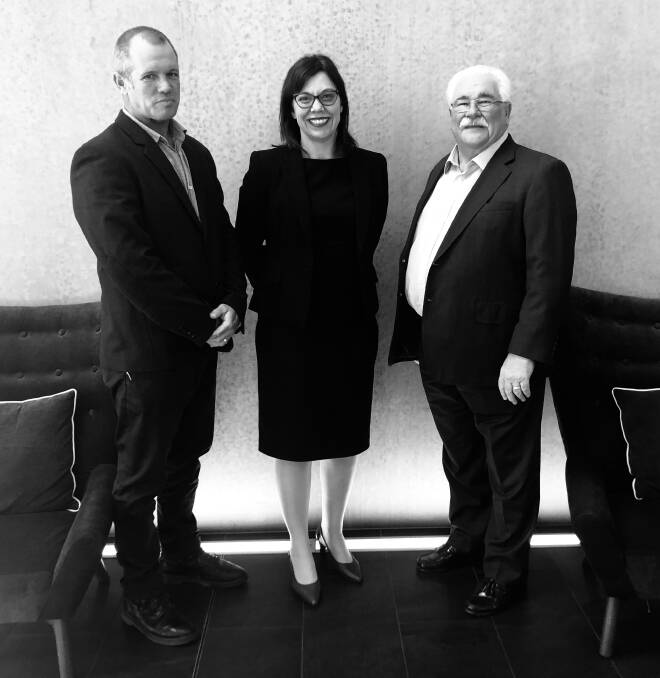 Recognition from the top: RDAMNC innovation and media manager Russell Pell, director Kerry Grace and chair John O'Neill