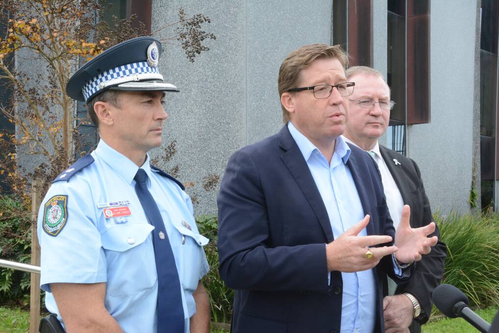 Manning Great Lakes Local Area Command chief inspector Allan Fidock, NSW Police Minister Troy Grant and Member for Myall Lakes Steven Bromhead discuss the upgrade to Taree Police Station. Photo: Scott Calvin.