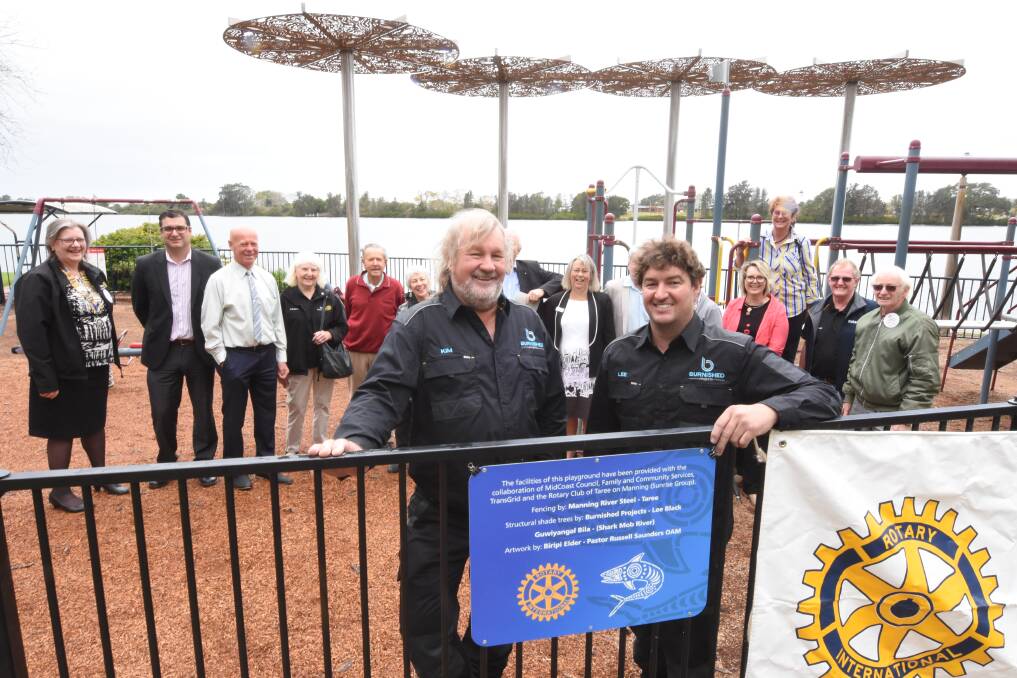 Job well done: Kim and Lee Black with Rotary Club of Taree on Manning members, MidCoast Council general manager Adrian Panuccio and Mayor David West. Photo: Scott Calvin.