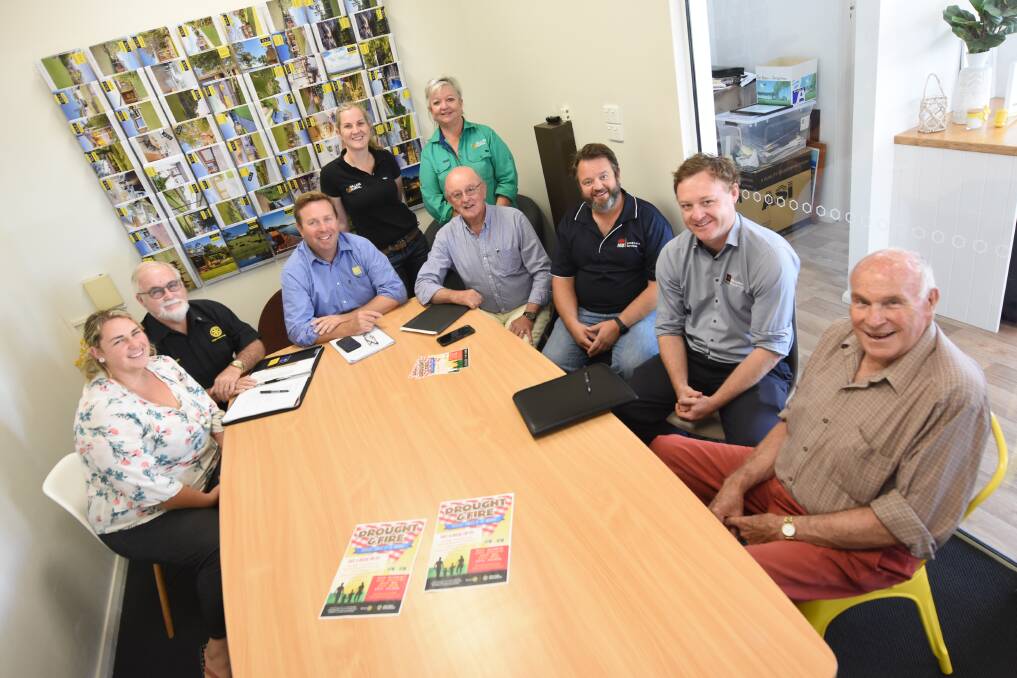 Representatives of local service clubs, businesses and organisations met at the Ray White office in Taree to discuss the social events for drought and bush fire affected families. Photo: Scott Calvin.