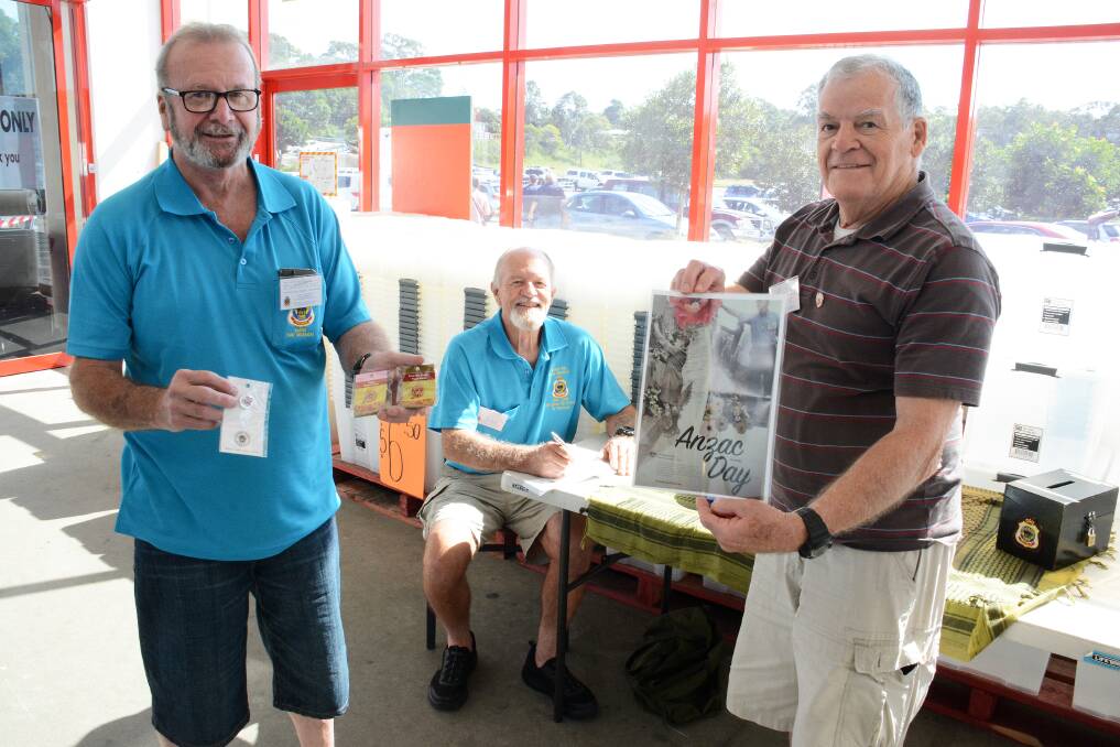 Taree RSL Sub-branch members John Connell, Harry Sinclair and David Plummer selling Anzac Day badges and raffle tickets at Bunnings Warehouse Taree. Photo: Scott Calvin.