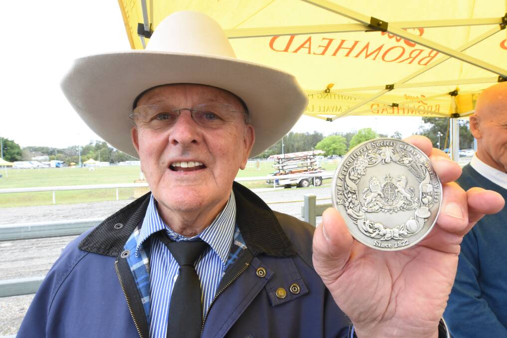 Well deserved: Taree Show ring announcer Bruce Moy was recognised for his volunteer efforts at local agriculture shows. Photo: Scott Calvin. 