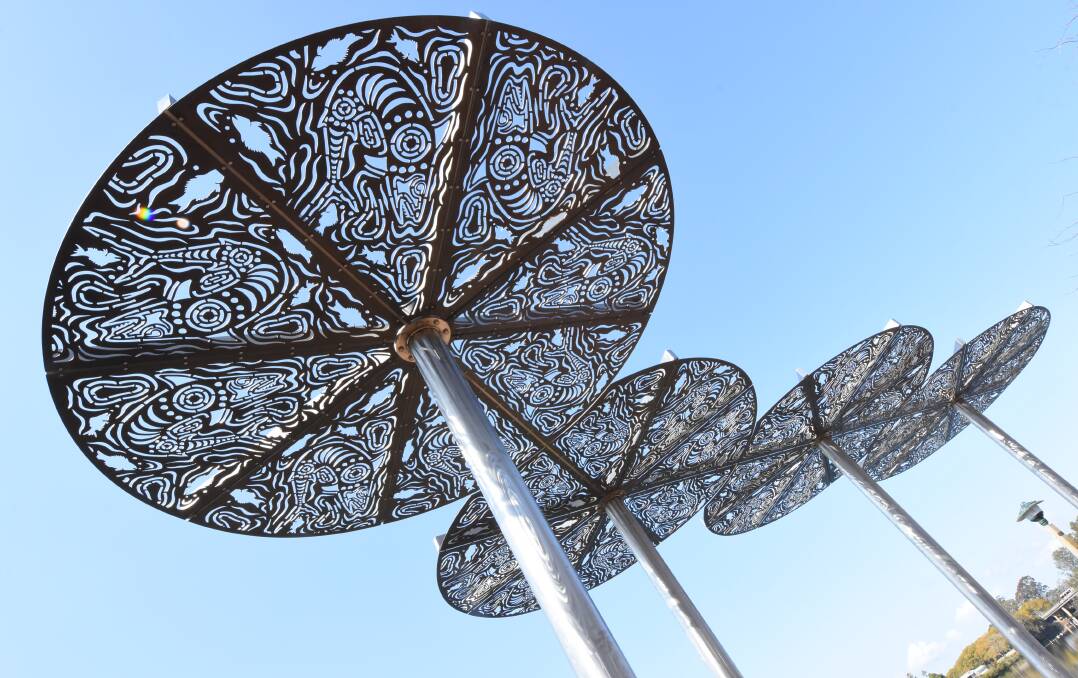 Providing shade: The shelters were created by local sculptor Lee Black and feature the Aboriginal inspired designs of Uncle Russell Saunders. Photo: Scott Calvin. 