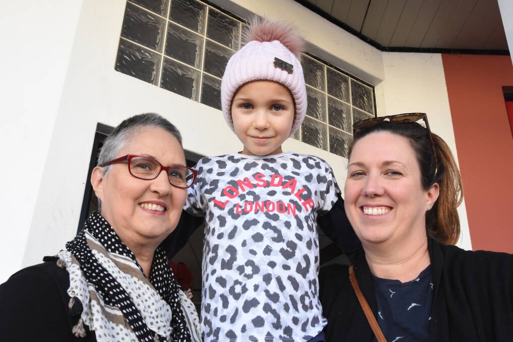 Fighter: Halle Kiehne, pictured with her grandmother Sharon Smyth and mum Danielle Smyth in June, is battling brain cancer. Photo: Scott Calvin.