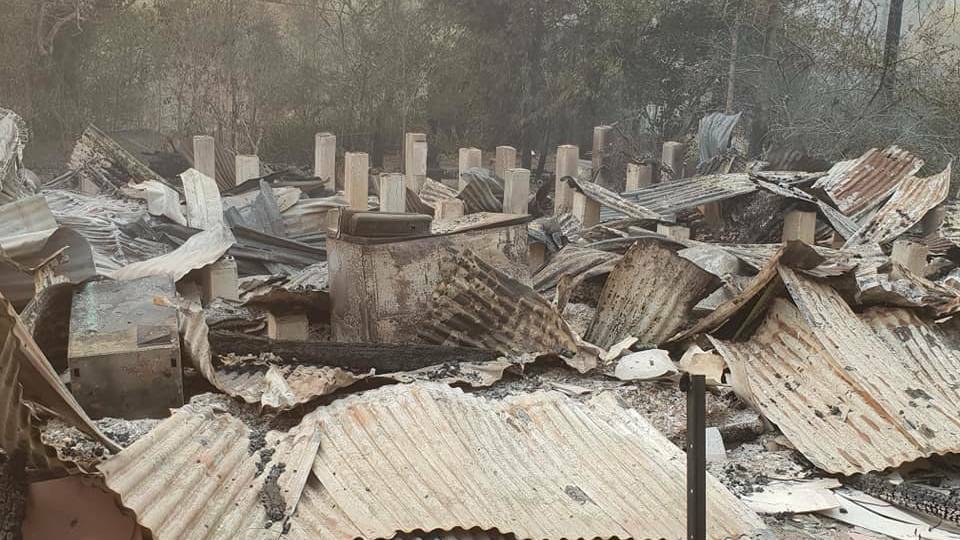 The aftermath of a bushfire that tore through Paul's home. Photo: Paul Miscamble/Facebook.