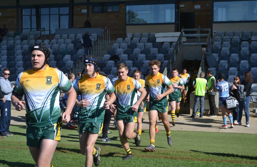 St Clare's run out for their open age final clash with Victoria's Mt Ridley College. Photo: Daily Liberal. 