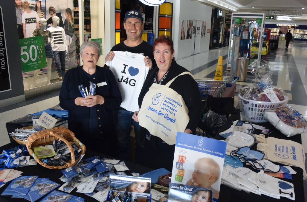 Support for research: Brenda Jackson, Bruce Hopper and Heather Bramble at the stall in Taree Central.