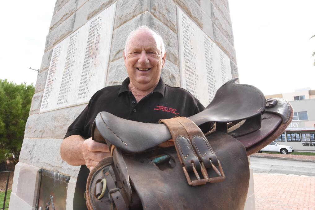 Special tribute: Mr O'Regan said the saddle, that belonged to soldier Eric Scarlett, will be placed on a horse at the Taree Anzac Day parade next Wednesday. Photo: Scott Calvin. 