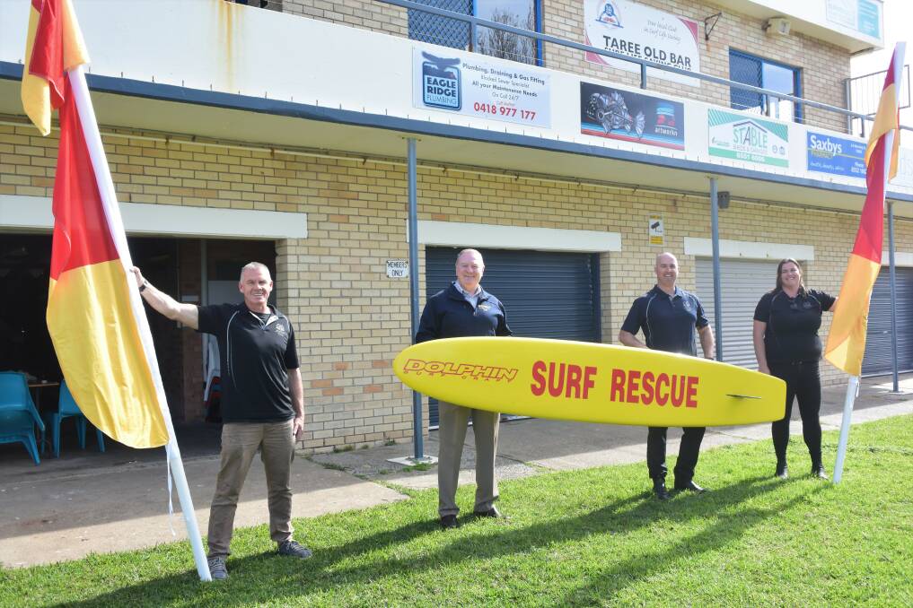 New era: Taree Old Bar SLSC lifesaving director Dean Donovan, Member for Myall Lakes Stephen Bromhead, club finance director Michael Cameron and president Jane Lynch outside the clubhouse. Photo: Rob Douglas.