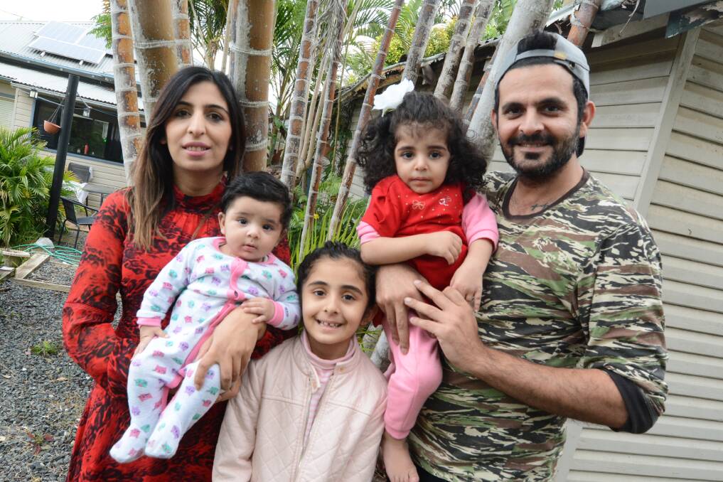 Home sweet home: Dr Sara Khalid and Hammad Hanif with their children Ayat, Amel and Samina returned to Taree two weeks ago. Photo: Scott Calvin.