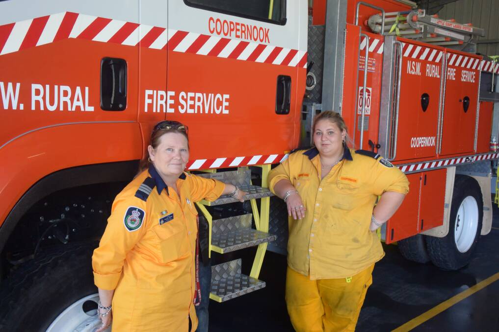 Passion for firefighting: Coopernook Rural Fire Brigade captain Joanne Collins and secretary/treasurer Sherrie Gaul. Photo: Rob Douglas. 