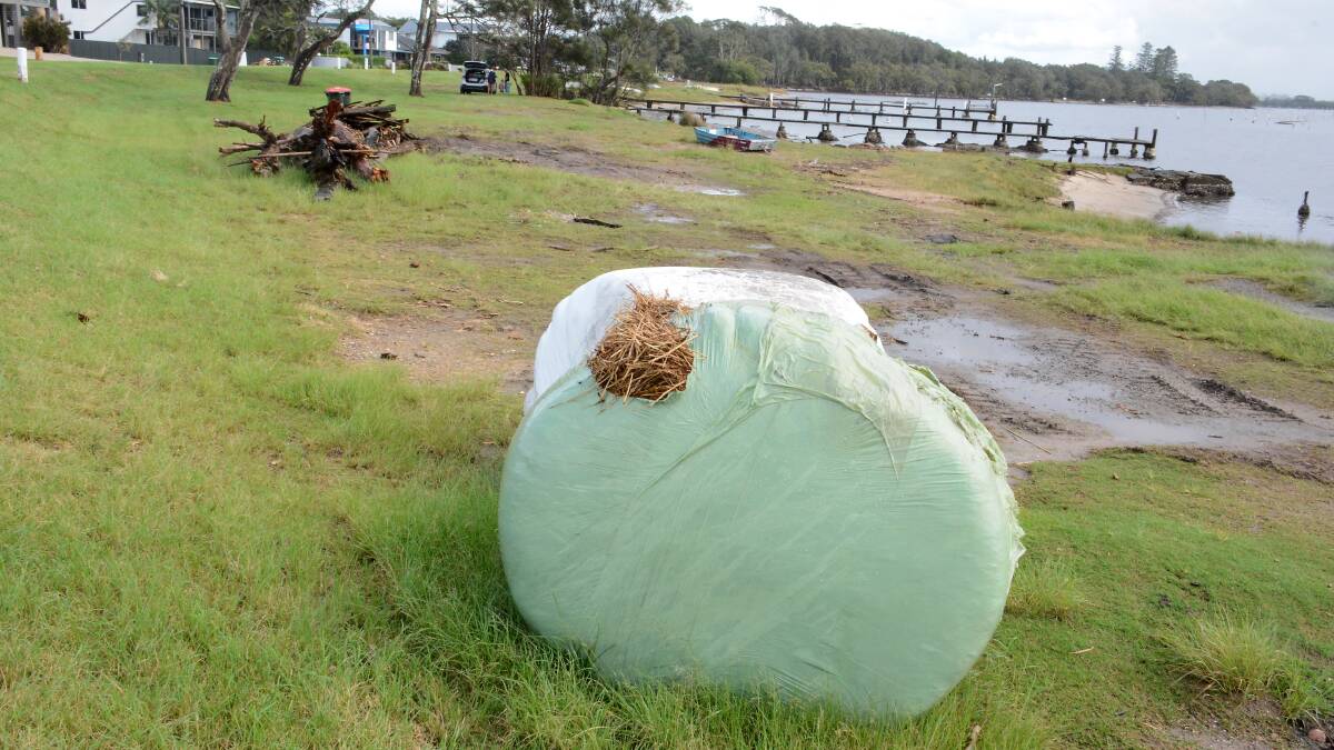 A silage bale washed ashore at Manning Point following the flood crisis in March. Photo: Scott Calvin.