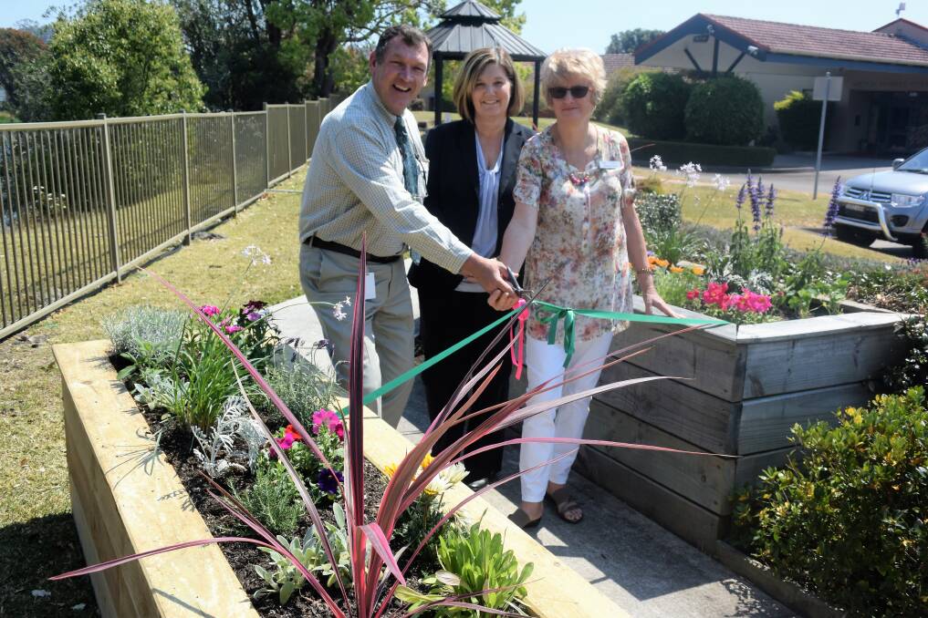 Anglican Care Auxiliary Manning president George Hoad, Storm Village residential care manager Karen Freeman and Auxiliary secretry Margaret Carey at the opening of the garden. Photo: Rob Douglas.