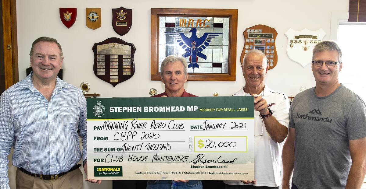 Member for Myall Lakes Stephen Bromhead presented the grant to Garry Tonkin, Richard Gliddon and club president Mark Drury. Photo: Ashley Cleaver/Cleavers Images.