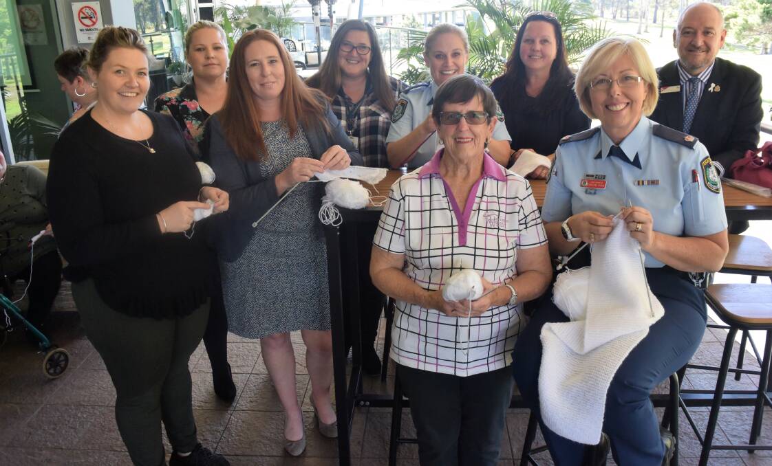 Ready, set, knit: Kira Knight, Kath Donovan, Renee Scarlett, Stacey Northam, Patricia Kimberly, Detective Acting Inspector Natalie Antaw, Lou Webber, Chief Inspector Christine George and Club Taree CEO Morgan Stewart.