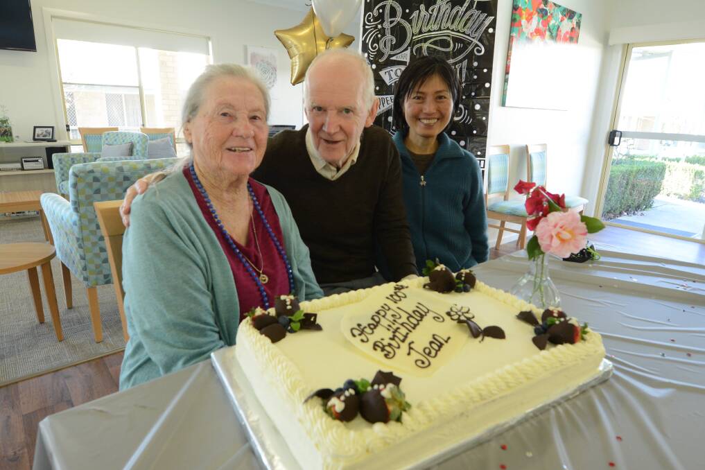 Many happy returns: Jean Whatson celebrated her 100th birthday with son Jim and his wife Maki. Photo: Scott Calvin.