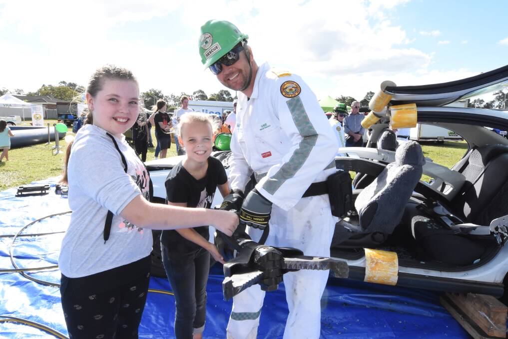 Charlotte King, Tiarna Green and Taree Rescue Squad's Matt King at the 2018 Weekend on Wheels. Photo: Scott Calvin.