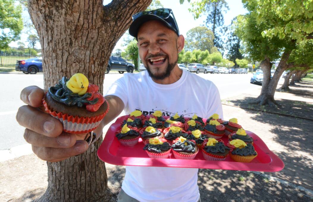 Jay brought some cupcakes, donning the red, yellow and black colours of the Aboriginal flag, to Taree High School staff.