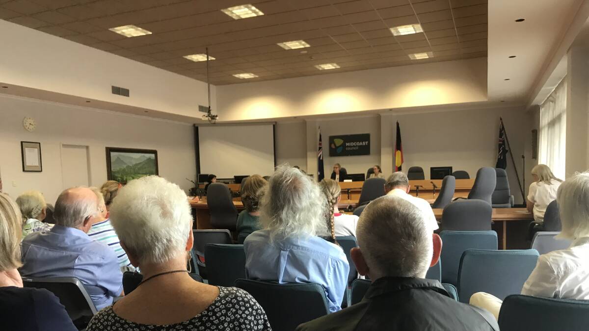 Residents watch on as the development application decision was handed down by the Hunter Central Coast Regional Planning Panel.