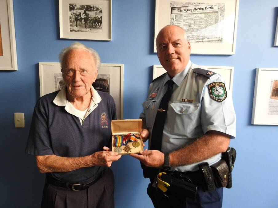 Ronald Marriott received his father's World War I medals from Ku-ring-gai Police Area Command Chief Inspector Dave Matthews.