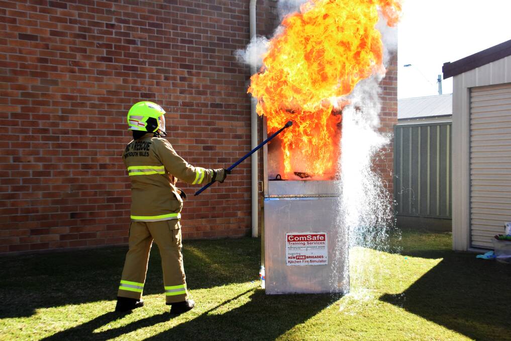 Be aware: A Taree firefighter demonstrates the effects of 'not looking when cooking'. Fire and Rescue NSW Taree has been called out to numerous fires in the last five weeks.