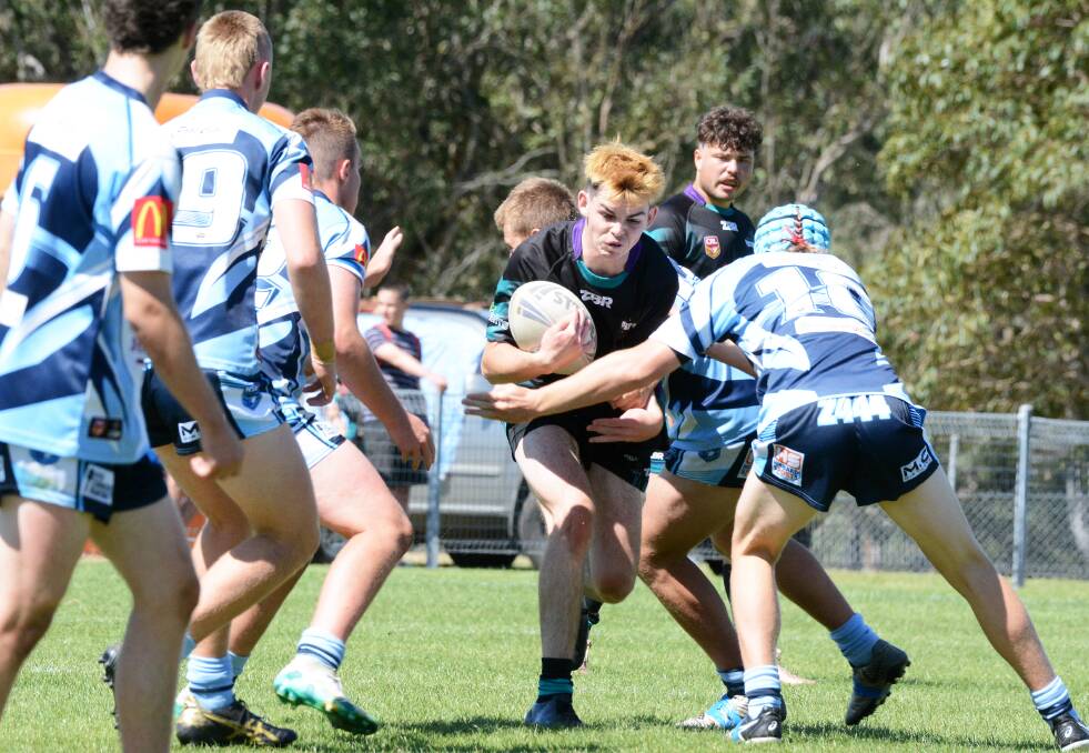 Levi Doran takes the ball up for Taree Panthers against Port City in the 2020 under 16s decider.