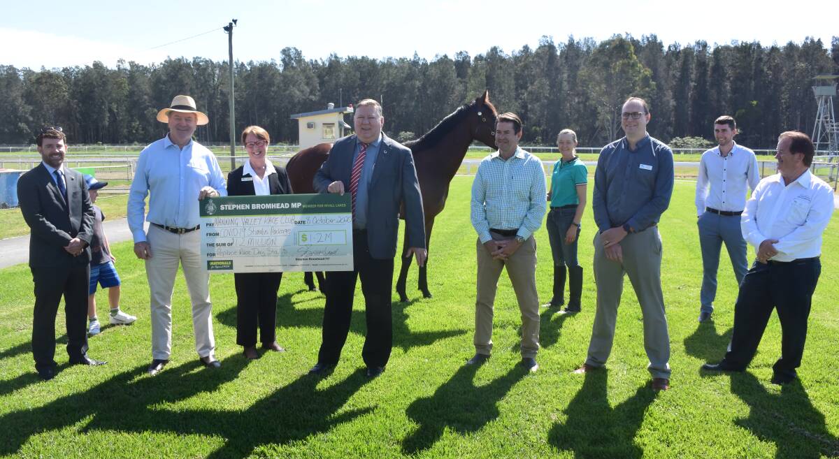Manning Valley Race Club chief executive Helen Sinclair and chairman Greg Coleman accepted the grant at the Taree track. They are pictured with Myall Lakes MP Stephen Bromhead, NSW Racing Minister Kevin Anderson and race club board members.