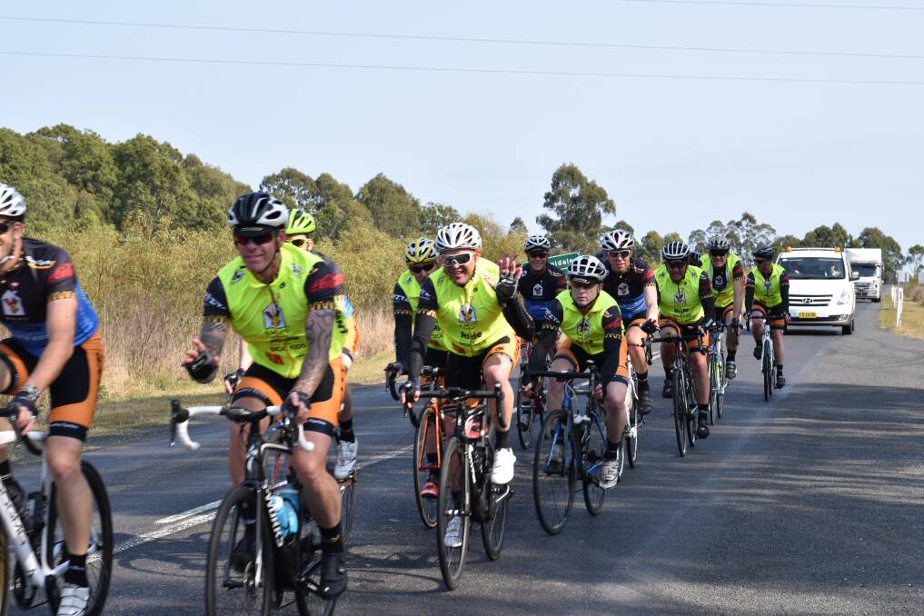 Riders with their support crew close behind. Photo: supplied.