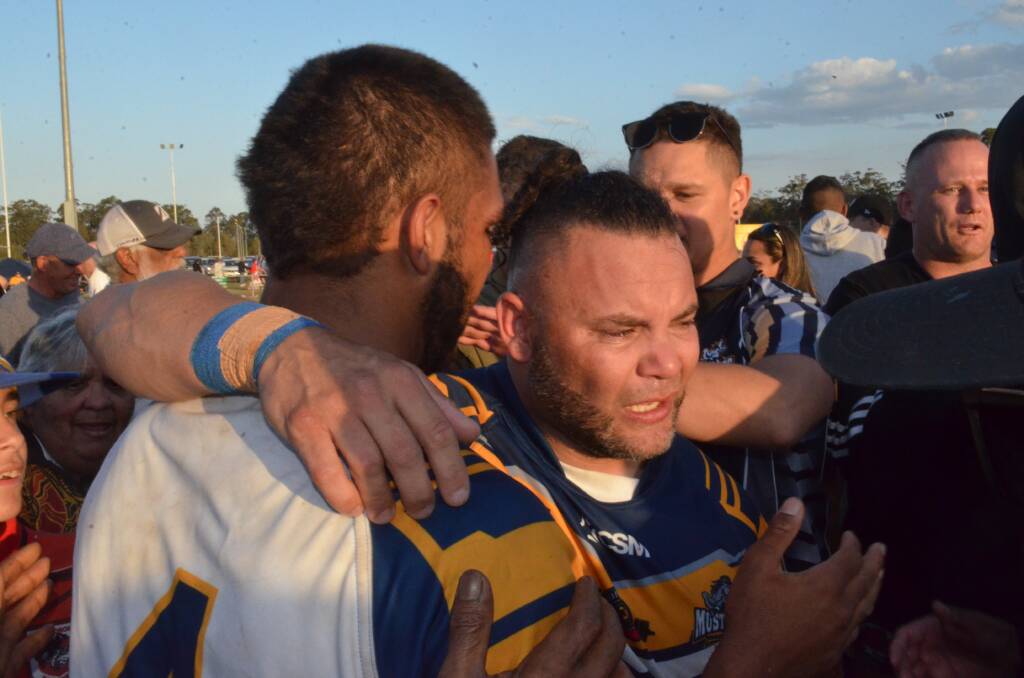 Raw emotion: Mustangs player-coach Russell Lardner lets the tears flow after the grand final victory. Photo: Callum McGregor