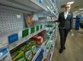 EMPTY SHELVES: Leah Davidson, of Amcal Award Pharmacy, Albury, and other Border pharmacists are seeing more and more customers trying to buy up cold and flu medicine this winter, leading to shortages. Picture: MARK JESSER