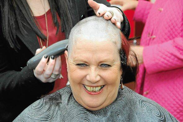 During: Old Bar hairdresser Joanne Johnson takes it all off for the Leukaemia Foundation.