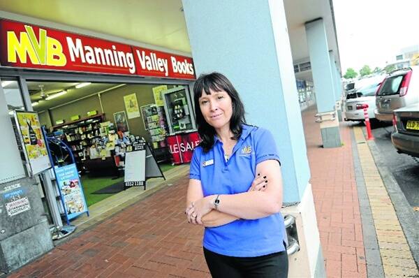 Concerned for employees: Manning Valley Books’ owner Nicky Stevens says she will take the expensive action of partly enclosing the front of her Manning Street store to overcome the problems of car exhaust fumes being pumped into the premises.