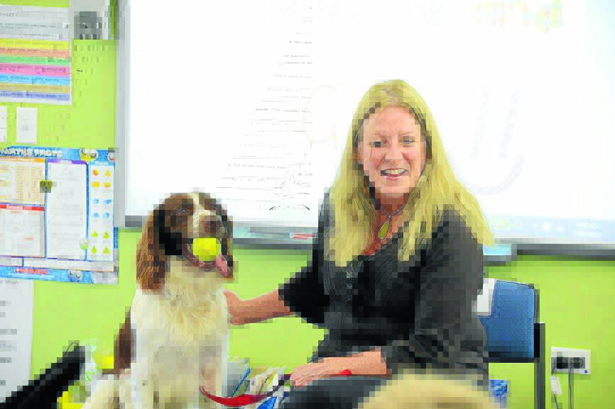 Narelle Campbell with her dog Gus at Coopernook School.
