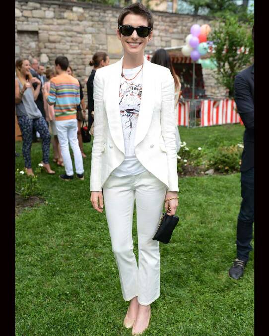 An elfin Anne Hathaway opts for a non-classic Ray-Ban at Stella McCartney's summer party. Here's lookin' at you, Anne.