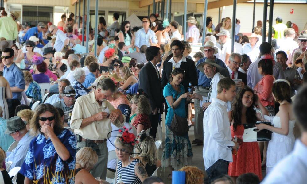 Spectators jam into the Bushland Drive track for last year's Melbourne Cup. A crowd of between 2000 and 3000 is expected next Tuesday.