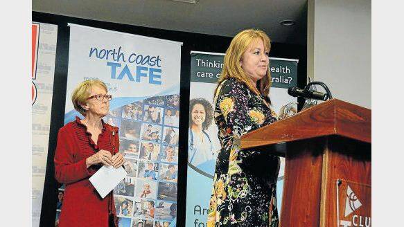 Wingham business owner, Donna Carrier on stage on Friday night accepting the Bruce Cowan Award, which was presented by Mr Cowan’s wife, Jan.