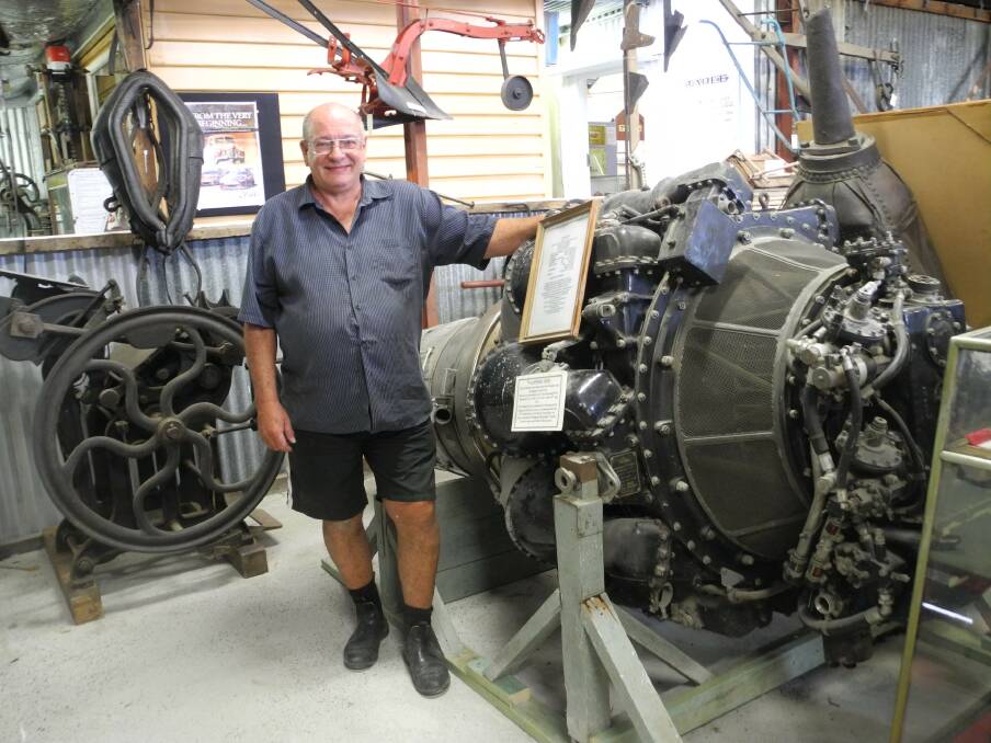 Terry Tournoff with the Vampire jet engine at Wingham Museum